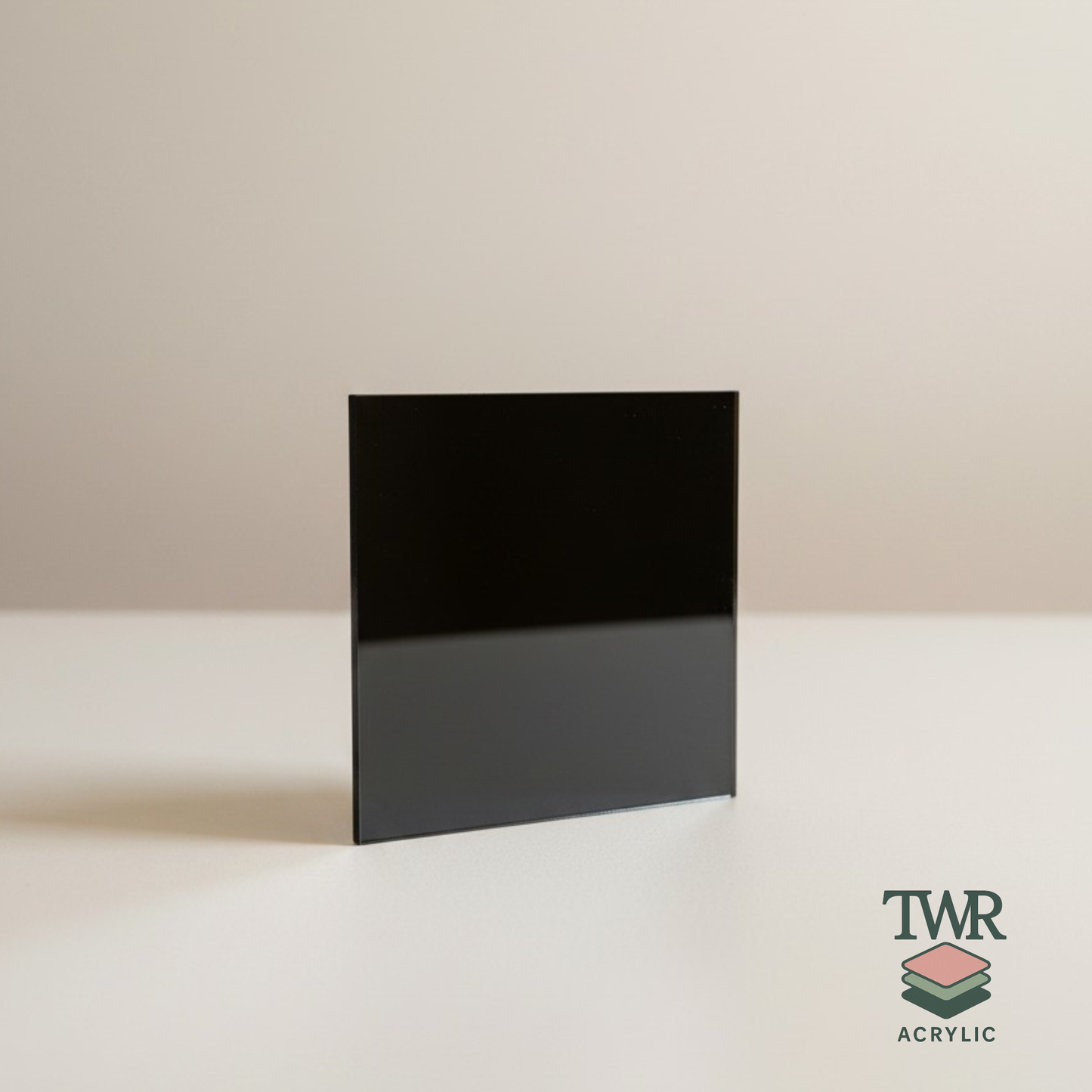 Black mirror acrylic sheet on a beige background with TWR Acrylic logo.