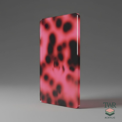 Pink and black spotted acrylic block on a gray background with TWR Acrylic logo.