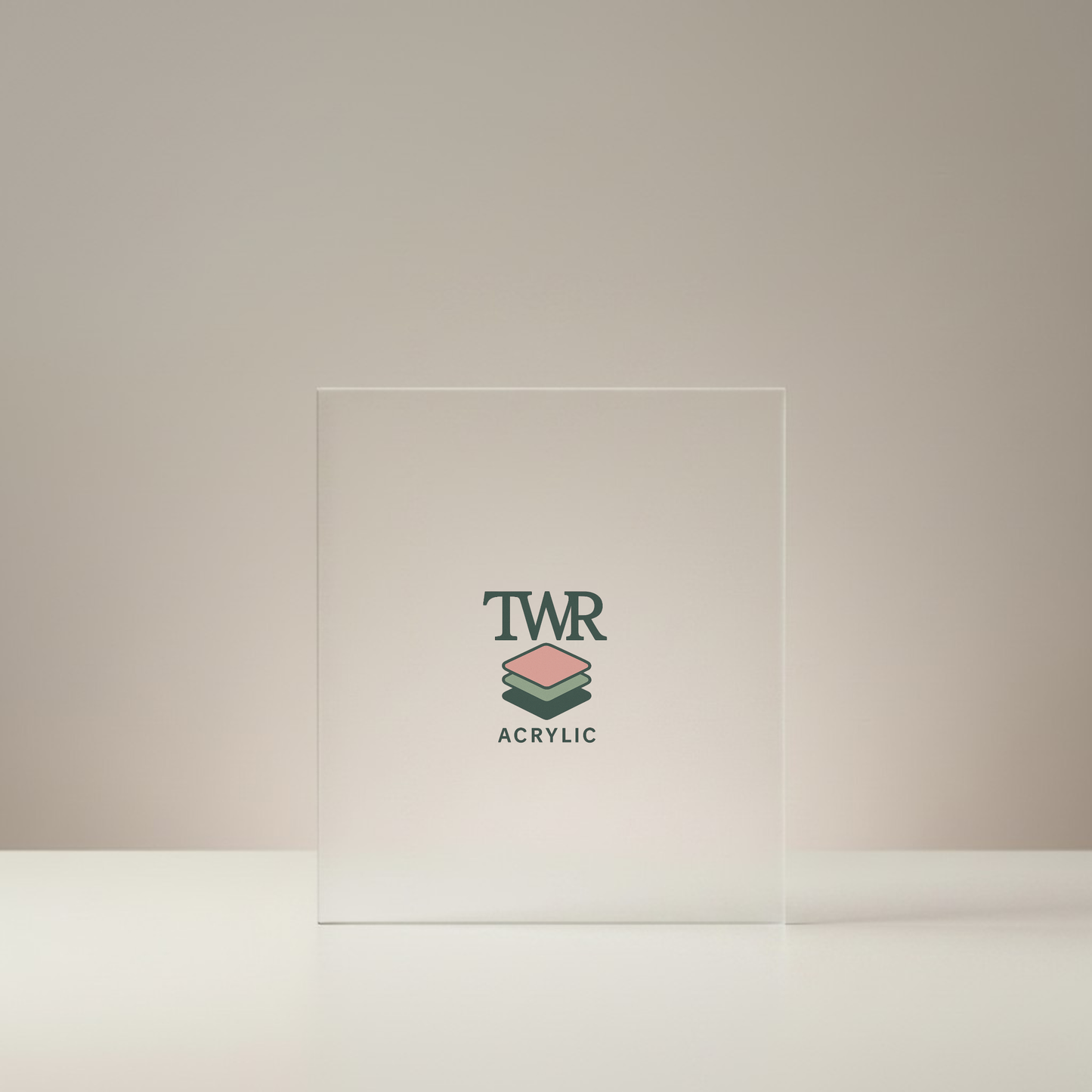 Clear frosted acrylic block with TWR Acrylic logo on a beige background
