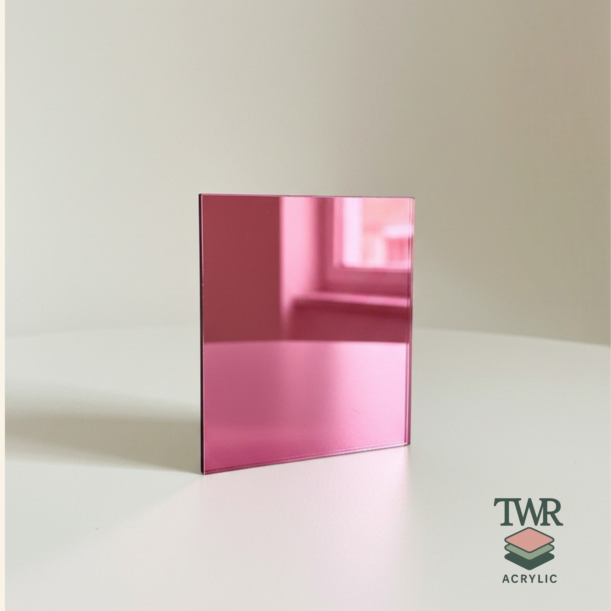 Pink acrylic sheet on a white surface with TWR Acrylic logo.