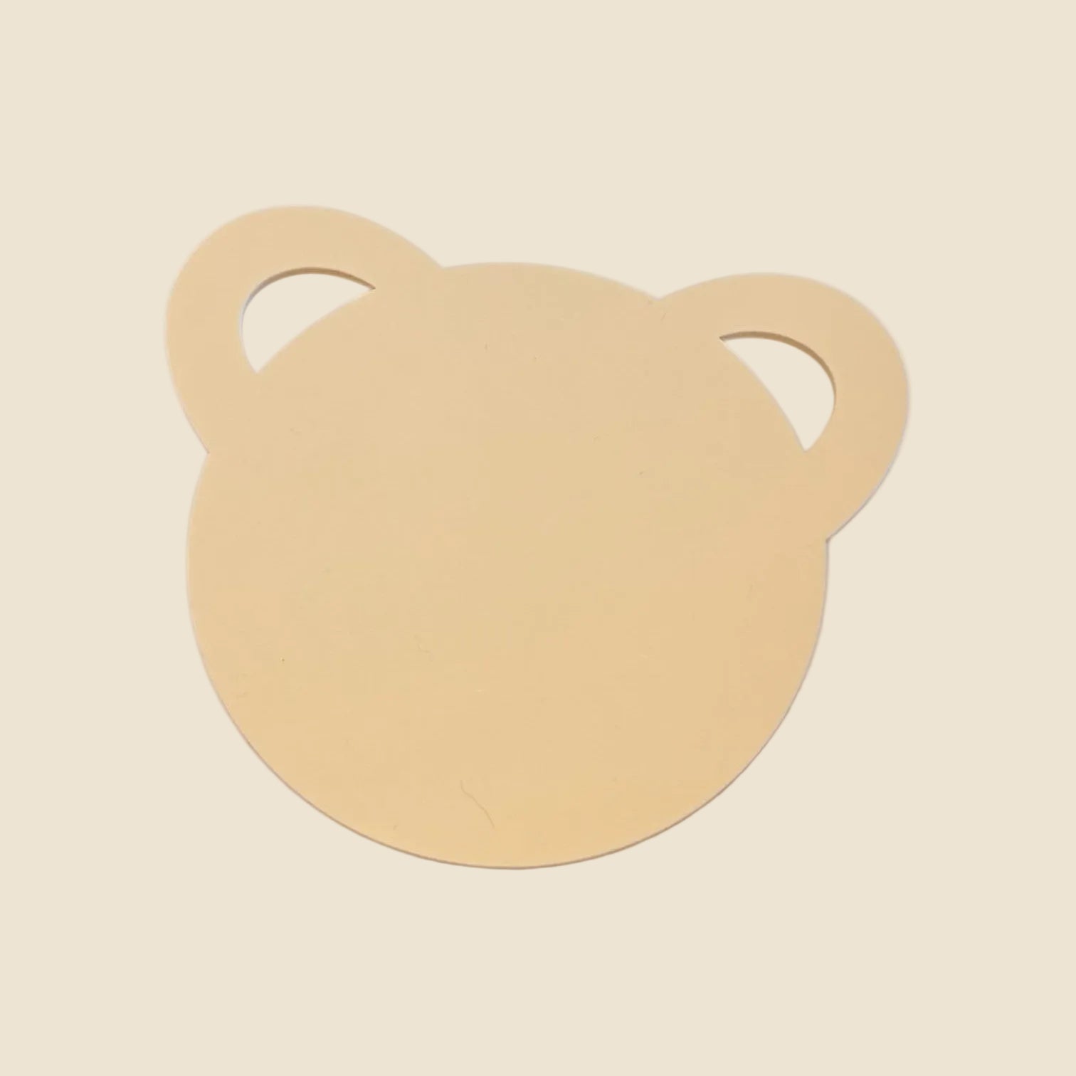 Beige acrylic blank bear design on a white background